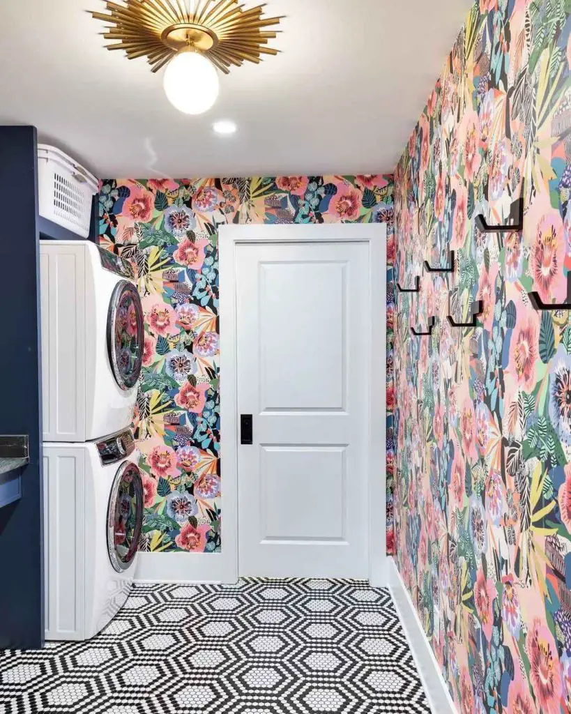 Colorful floral wallpaper in small laundry room