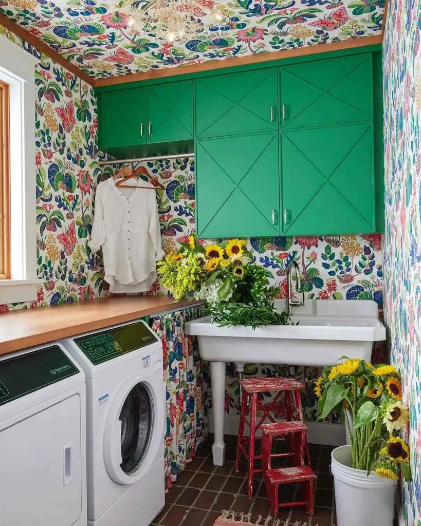 Laundry room with lemon tree wallpaper