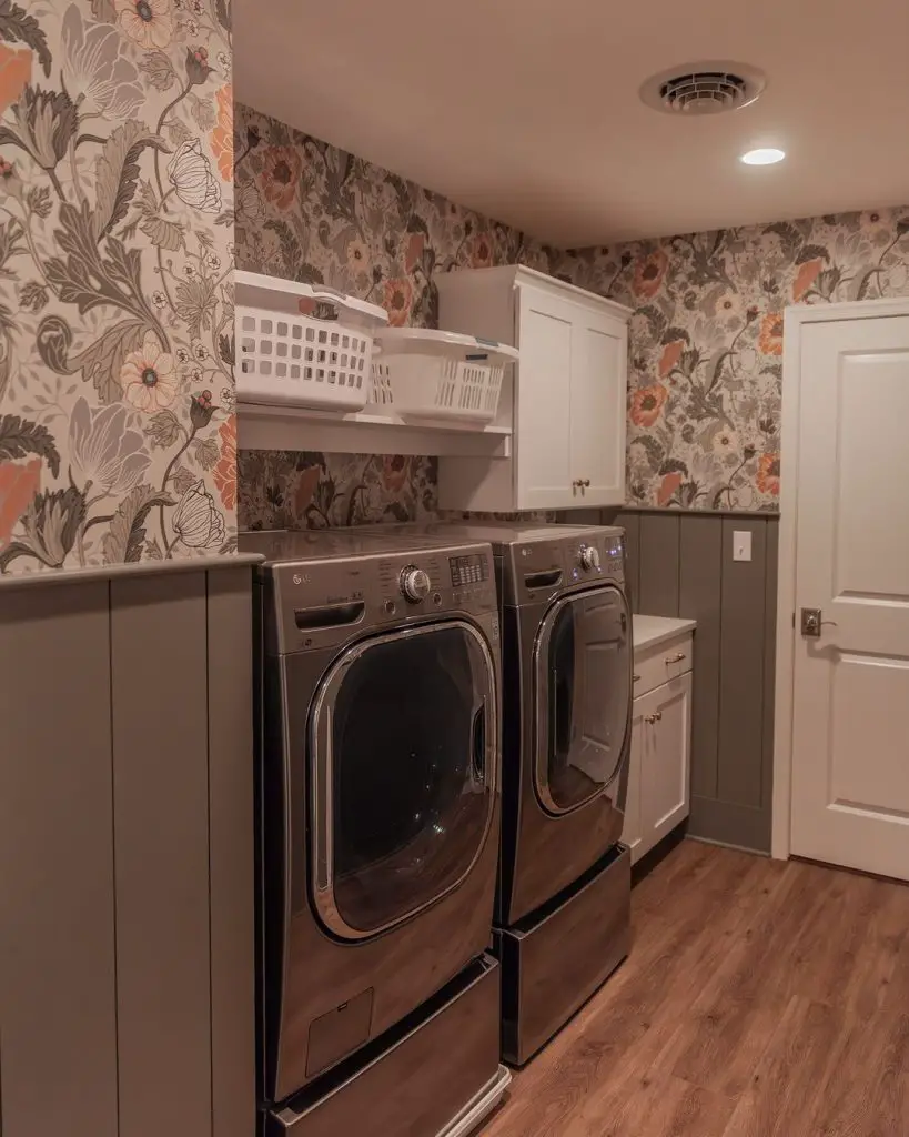 Floral wallpapered laundry room with modern appliances