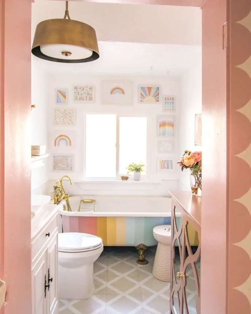 Bathroom with rainbow bathtub and pastel artwork gallery