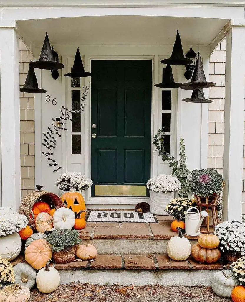 Halloween porch with floating witch hats pumpkins and bat decorations