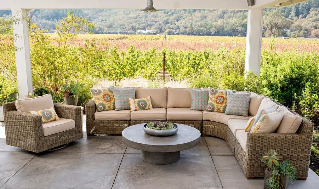 Patio seating overlooking scenic vineyard landscape