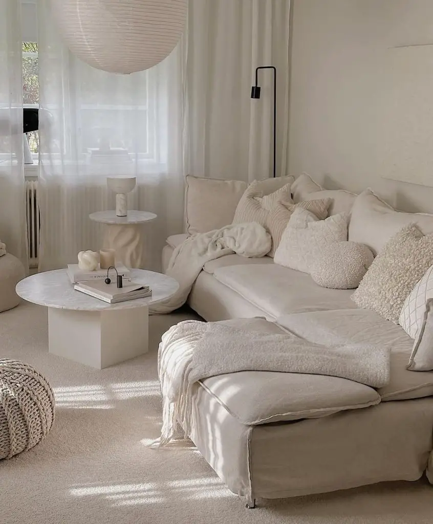 Minimalist living room with sculptural ceiling light"