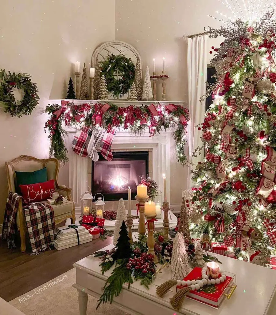 Festive living room with decorated fireplace and Christmas tree