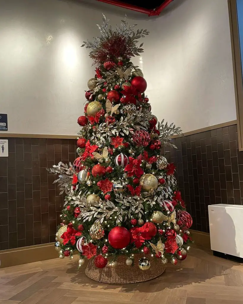 Christmas tree with silver leaves and red ornaments