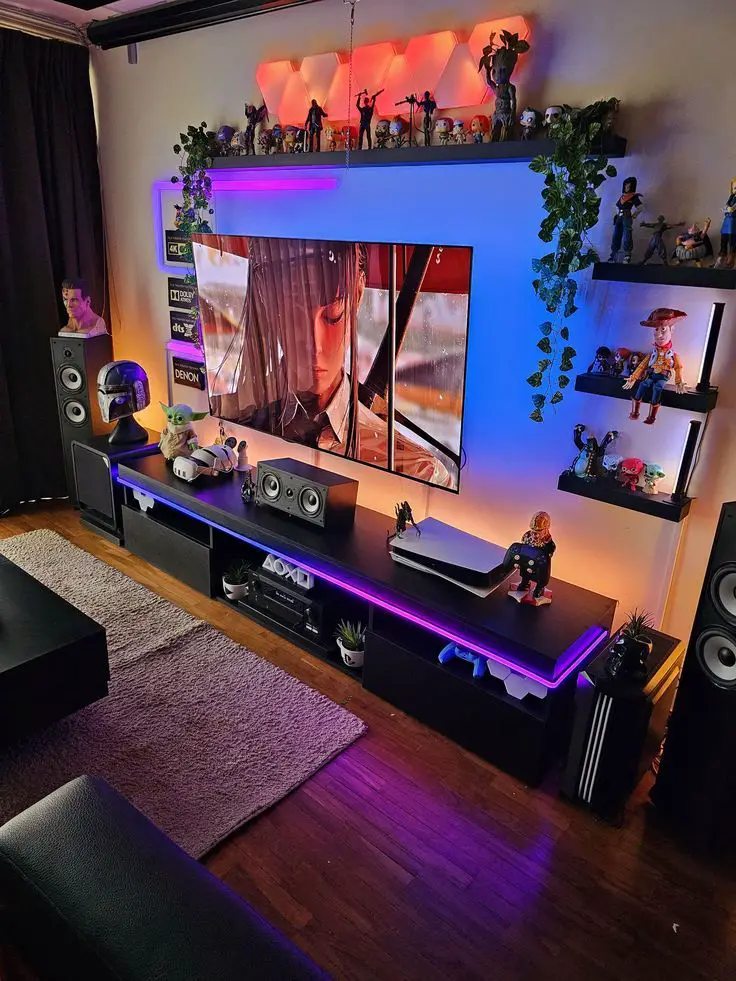 Gaming room with large TV, LED lighting, and shelves filled with pop culture collectibles.