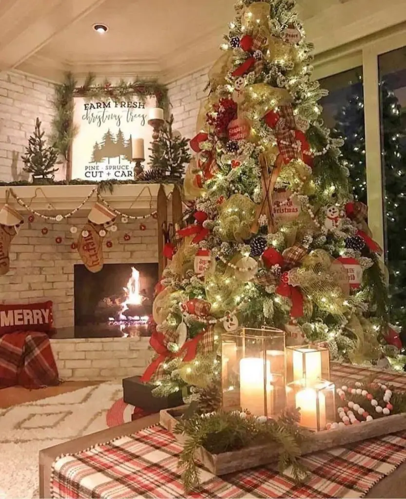 Christmas tree and fireplace brighten living room for holidays.