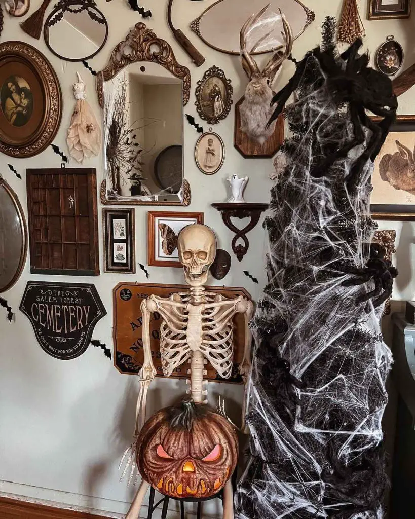Gothic Halloween wall display with skeleton antiques and spooky decorations