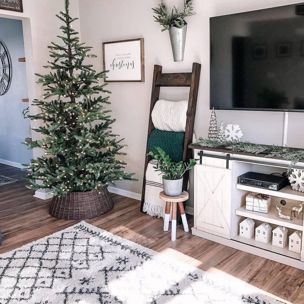 Minimalist living room with Christmas tree and farmhouse decor