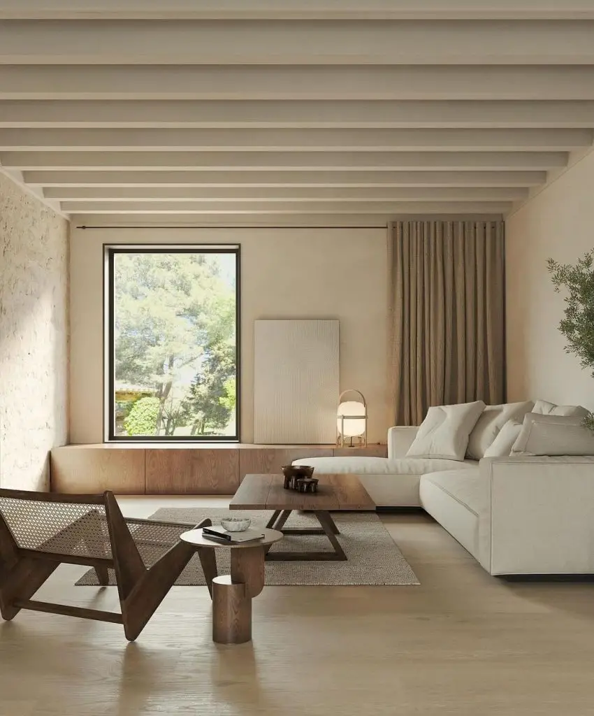 Minimalist living room with beamed ceiling and nature view