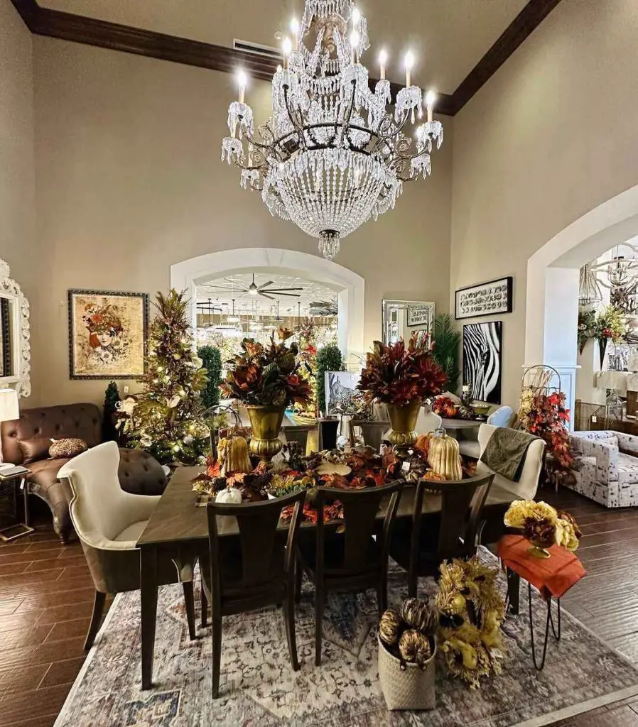 Luxurious dining room with chandelier and fall decor