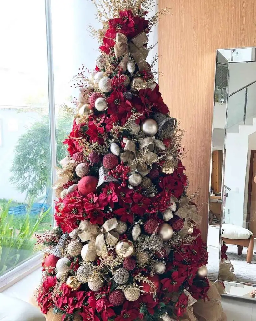 Luxurious poinsettia tree with champagne accents