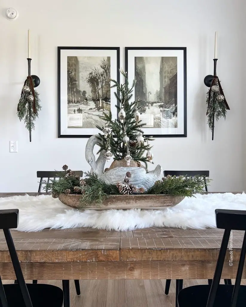 Holiday table with swan planter and city artwork