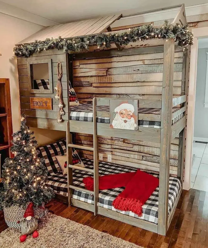 Bunk bed dressed for Christmas with lights, ornaments and gnomes