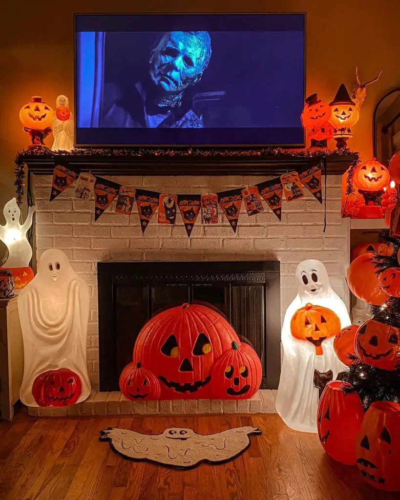 Halloween-decorated living room with TV horror movie pumpkins and ghosts
