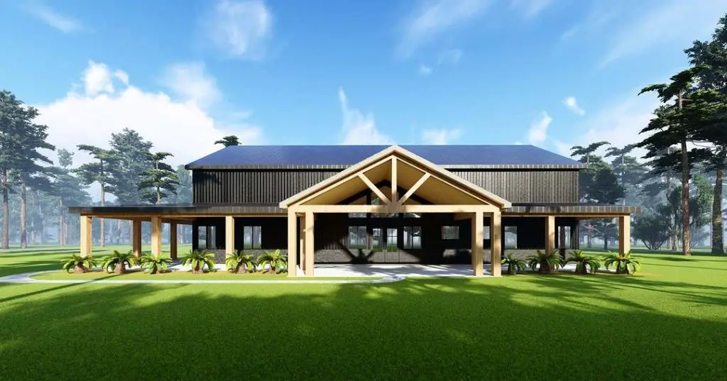 Modern black barn house with breezeway and palm gardens
