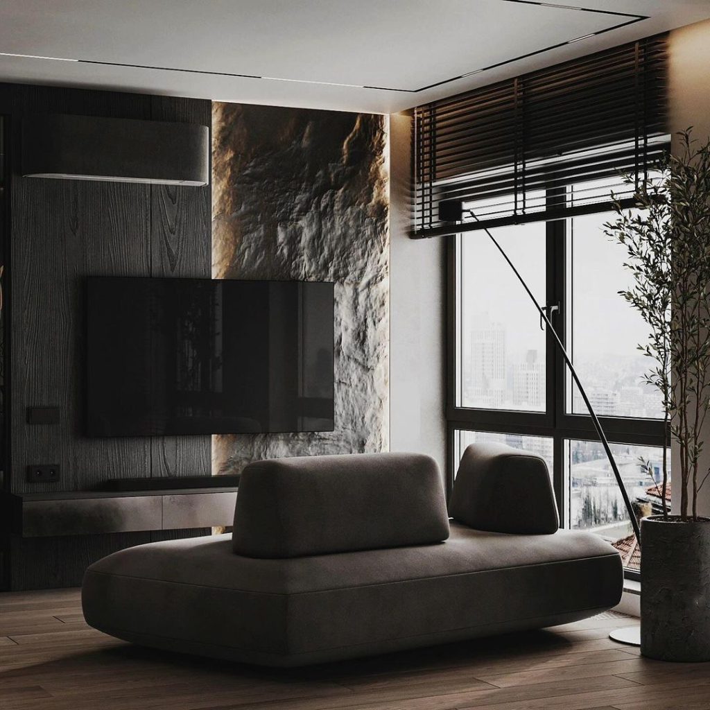 Modern dark living room with textured walls and city view.