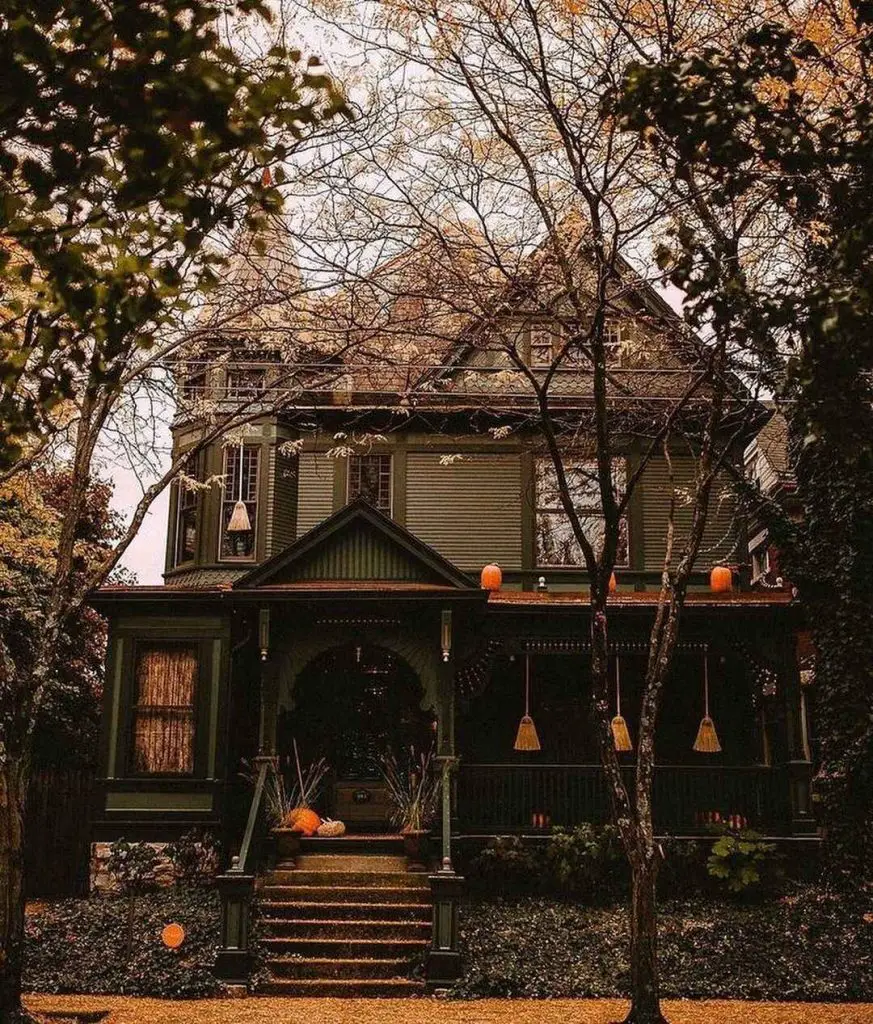 Autumn-decorated Victorian house with Halloween touches