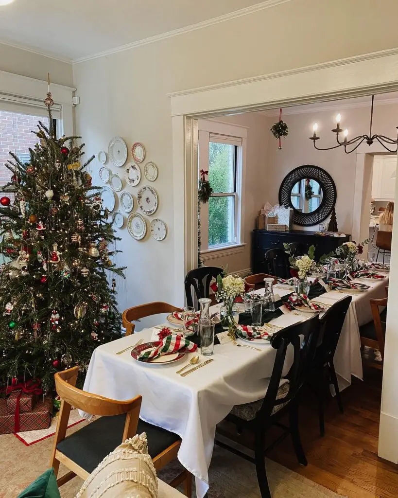 Festive dining room with Christmas tree and set table