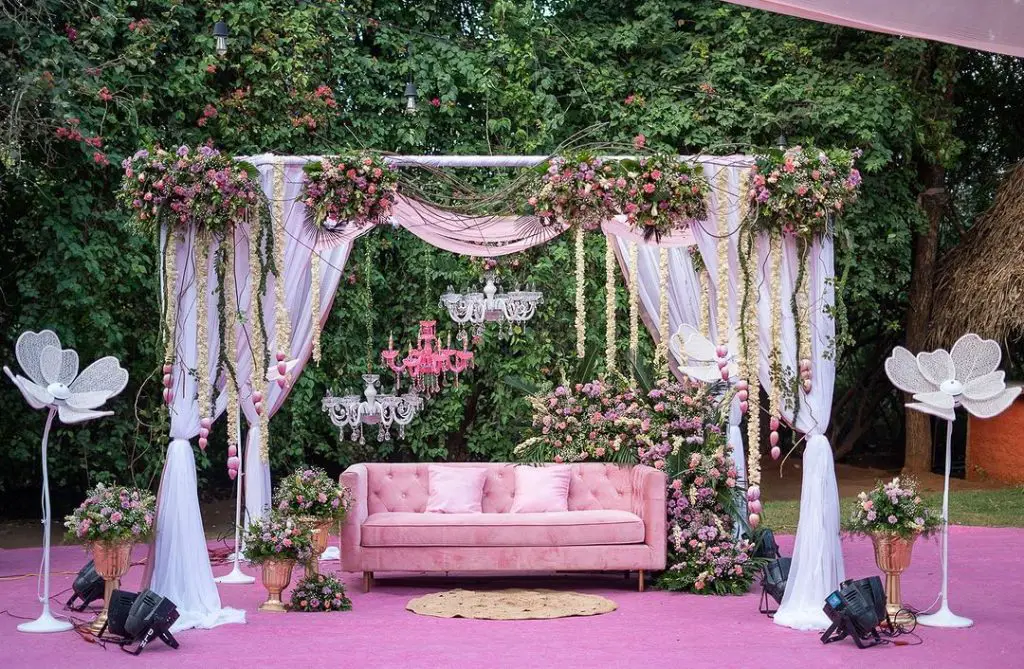 Luxurious pink floral outdoor wedding lounge
