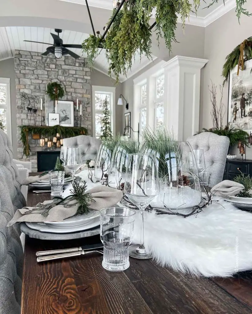 Elegant winter-themed dining room with greenery