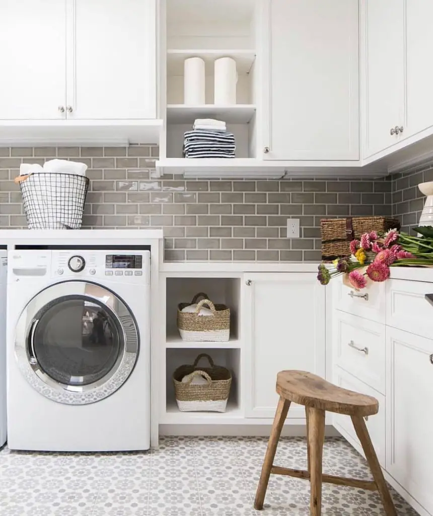 Bright cottage laundry room with patterned tiles