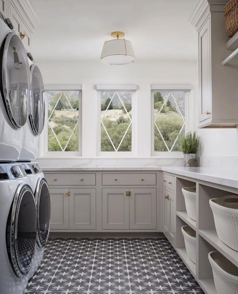 Modern laundry room with diamond windows and geometric tiles