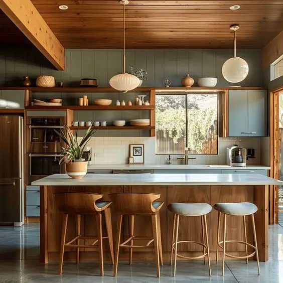 Modern kitchen with sage cabinets and wooden accents