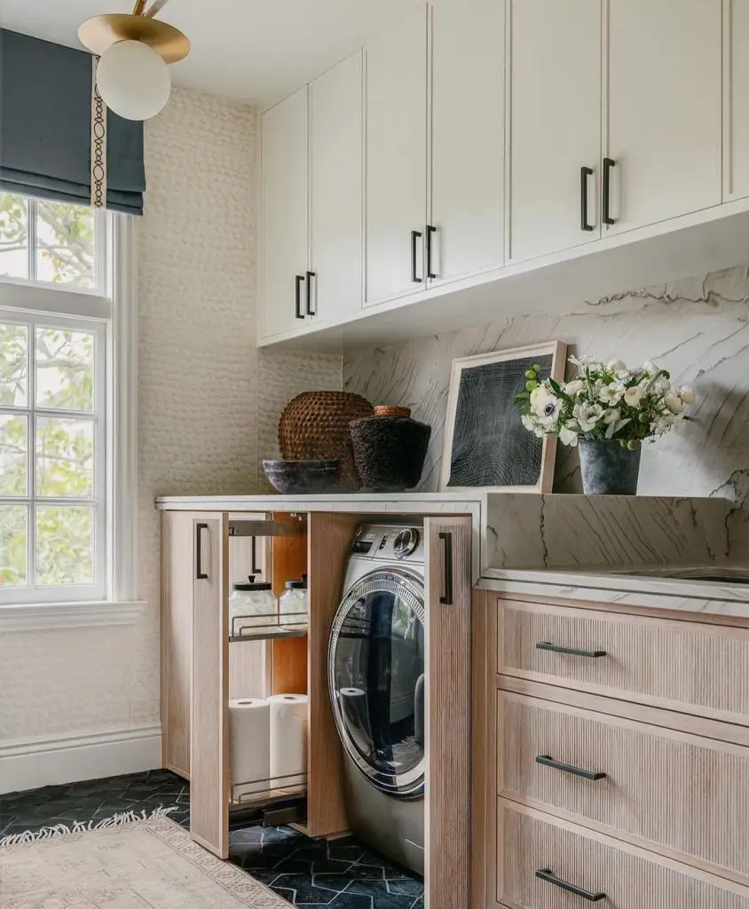 Concealed washer laundry room with marble accents
