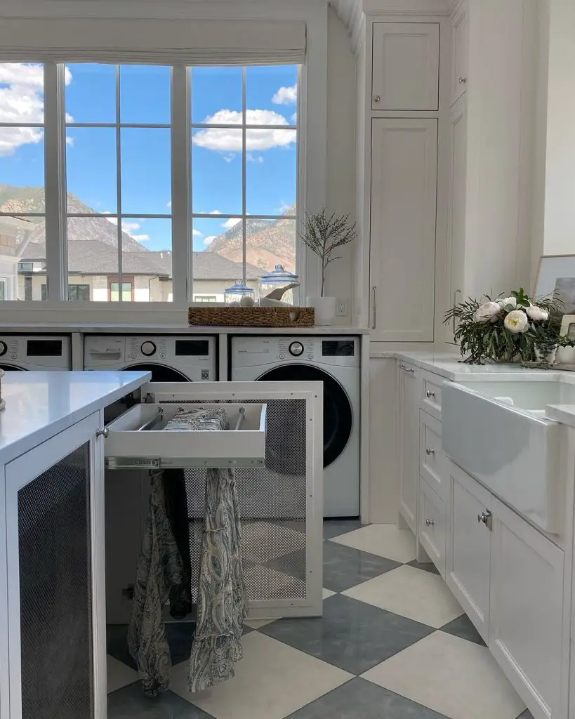 Luxury laundry room with mountain views and pull-out drying rack