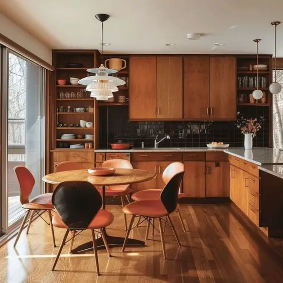 Retro kitchen dining space with coral chairs and wood