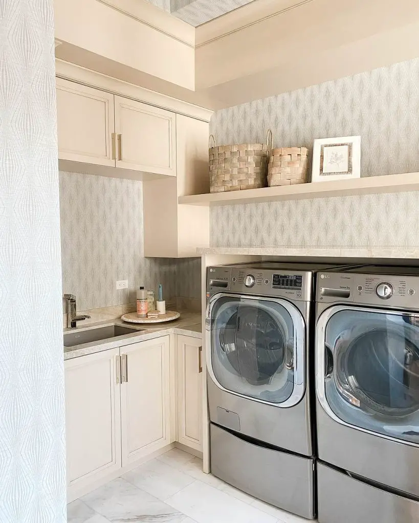 Contemporary laundry room with textured walls and floating shelves