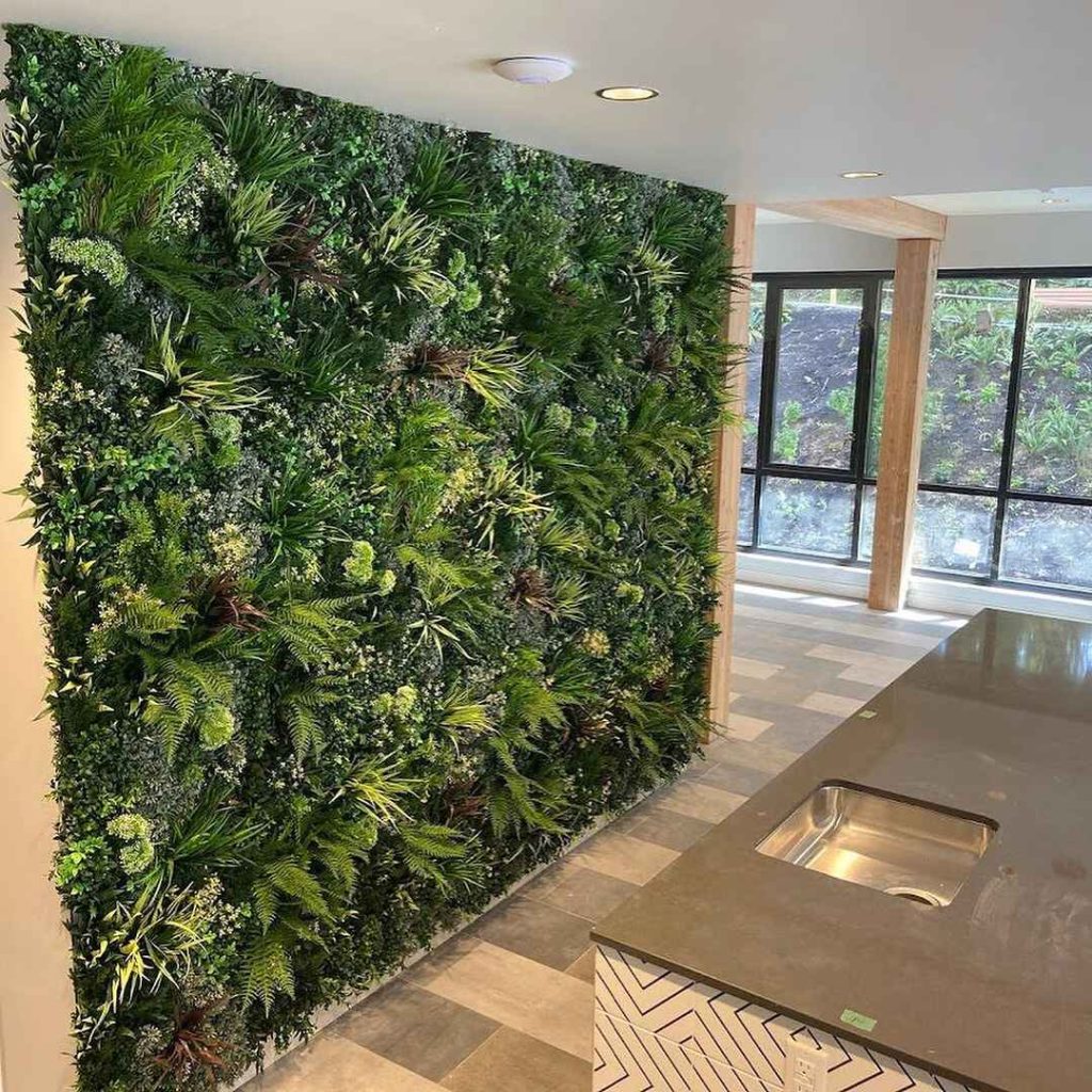Floor to ceiling tropical plant wall