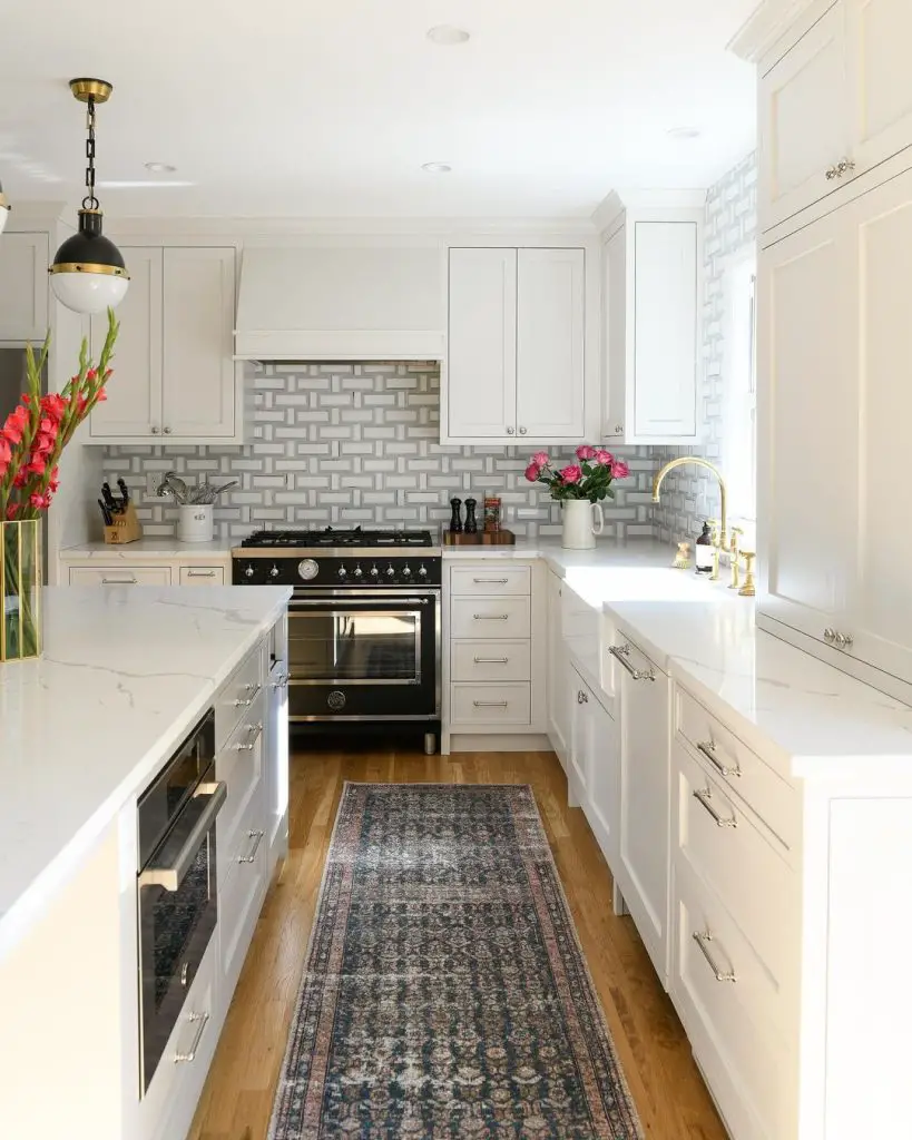 Galley kitchen with vintage runner and geometric backsplash