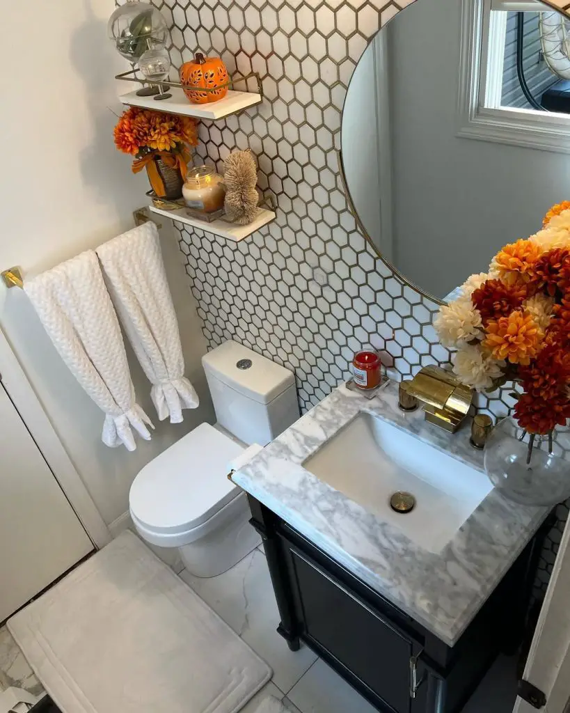 Contemporary powder room with hexagon tiles and orange autumn decor