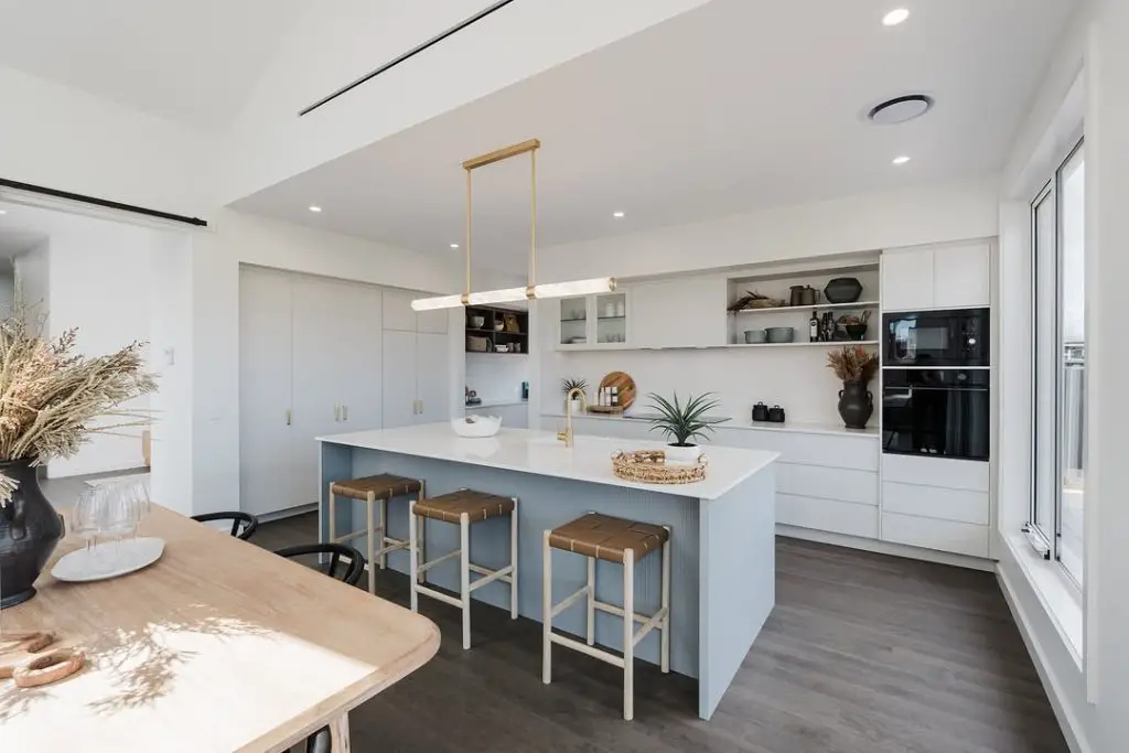 Blue and white kitchen with natural wood accents