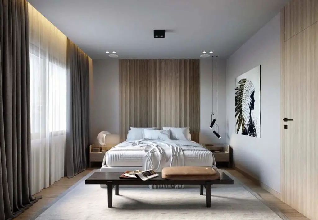 Luxury bedroom with botanical wallpaper pink tufted headboard and geometric ceiling design.