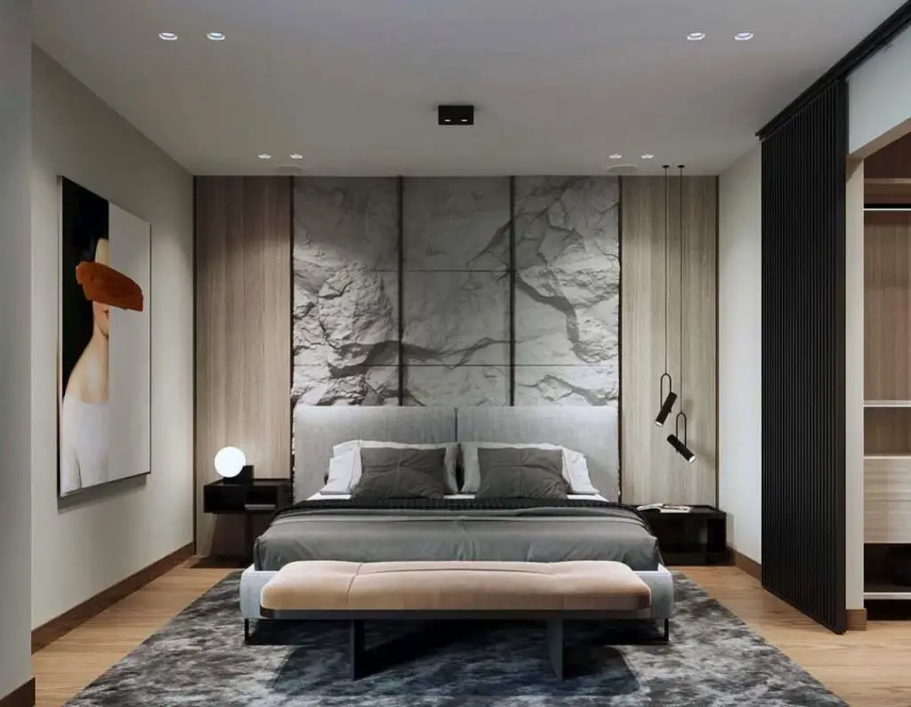 Modern bedroom with geometric art hanging lights and olive green bench seating.