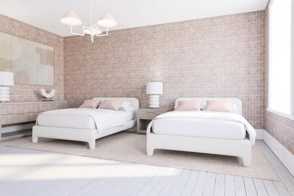 Twin bedroom with textured walls white beds and matching decor