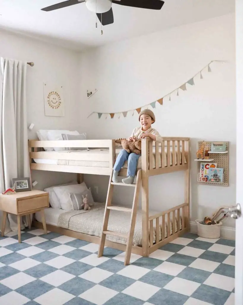 Natural wood bunk bed with checkered floor and minimalist happy decor