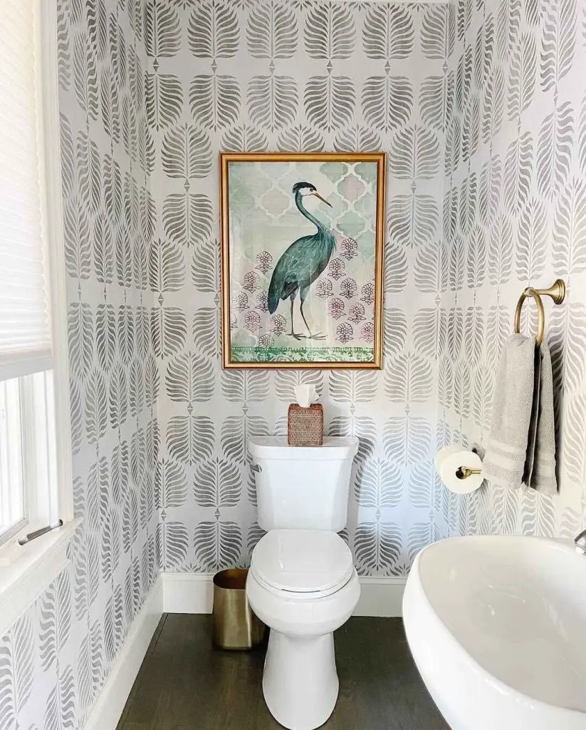 Modern powder room with grasscloth walls console sink and brass sconces