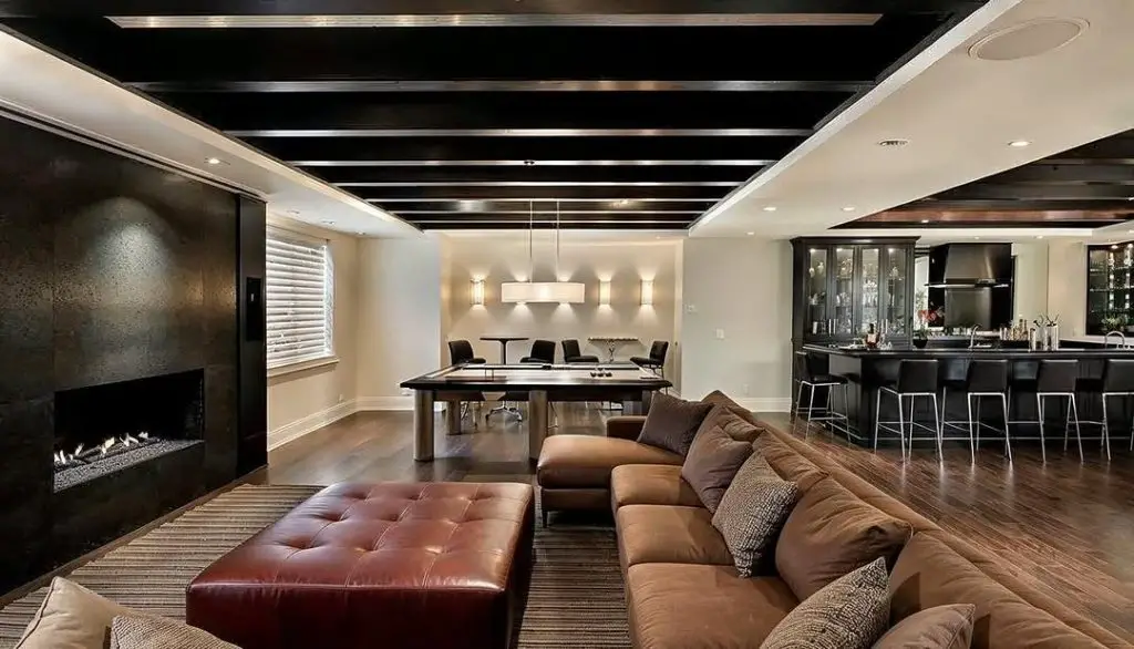 Eclectic basement TV room with bold patterns