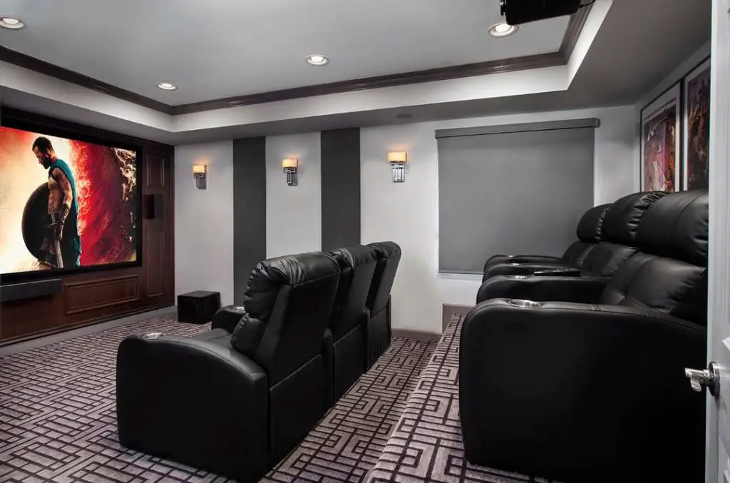 Family-friendly basement TV room with colorful decor.