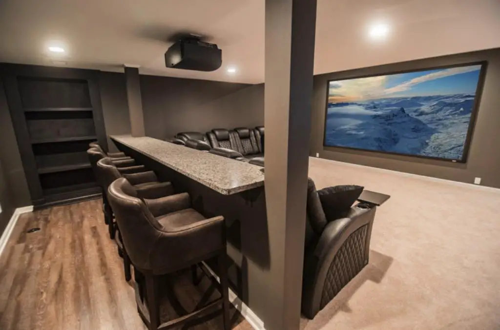Loft-style basement with TV and brick walls
