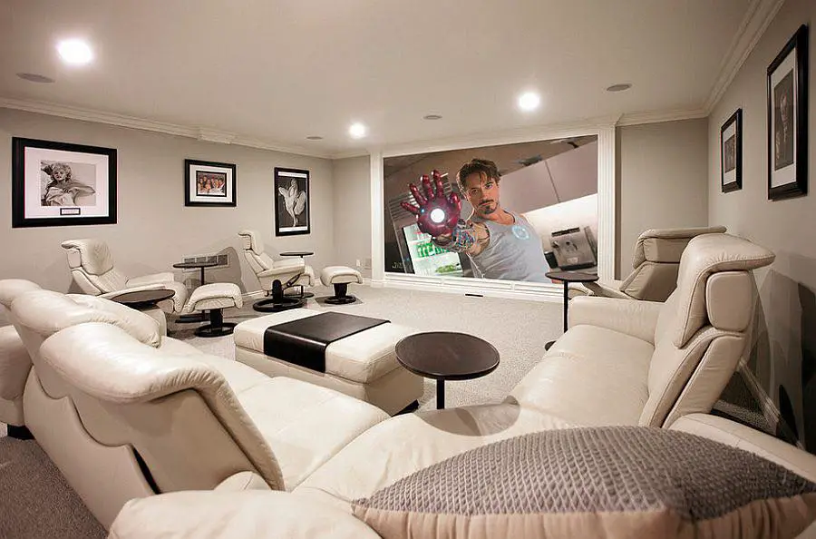 White basement TV room with hidden storage