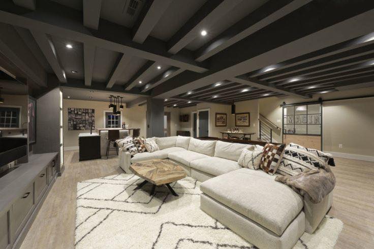Futuristic basement TV room with LED accents.