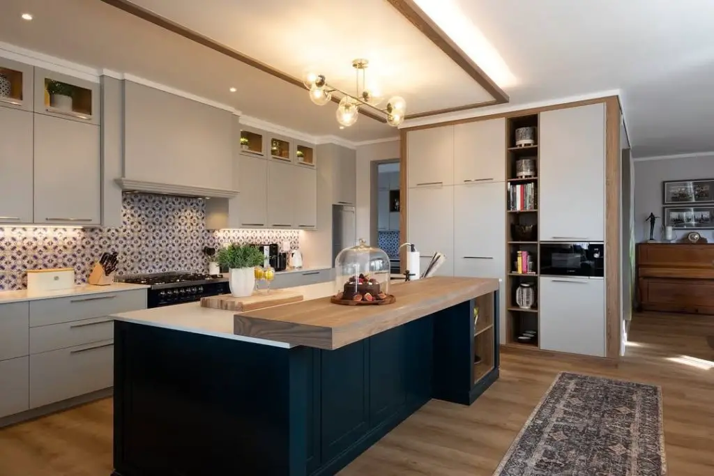 Modern kitchen with patterned tiles and wood details