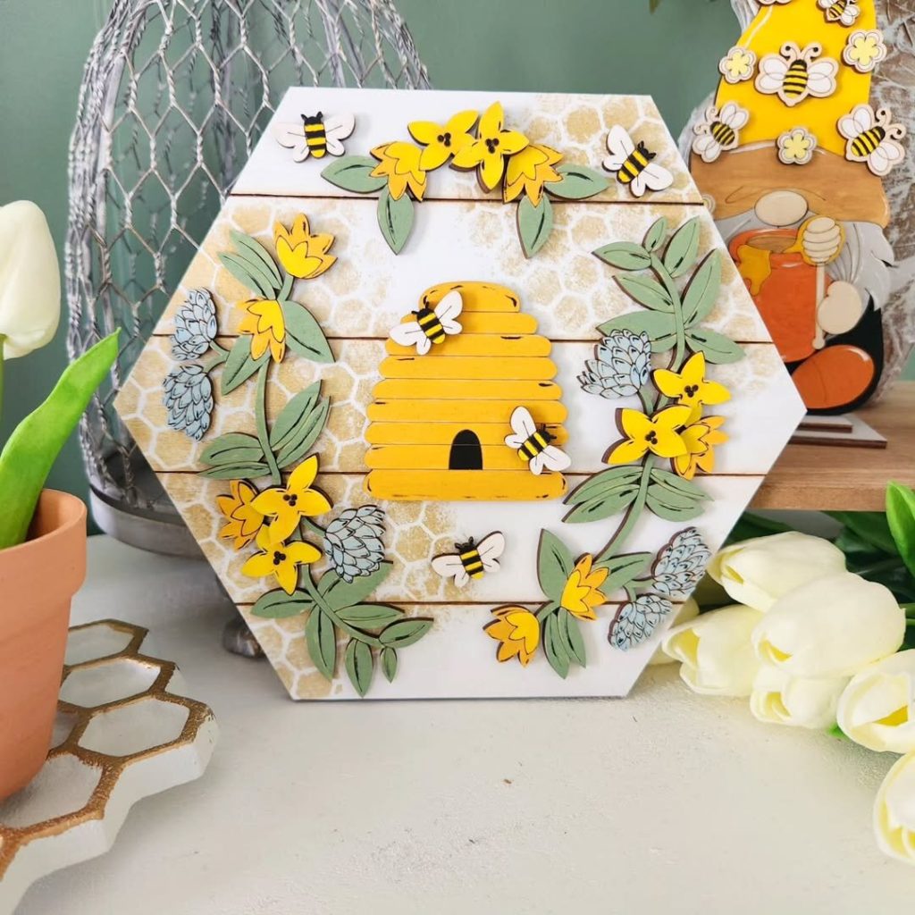 Hexagonal wall art with a yellow bee hive, flowers, and bees on a honeycomb background