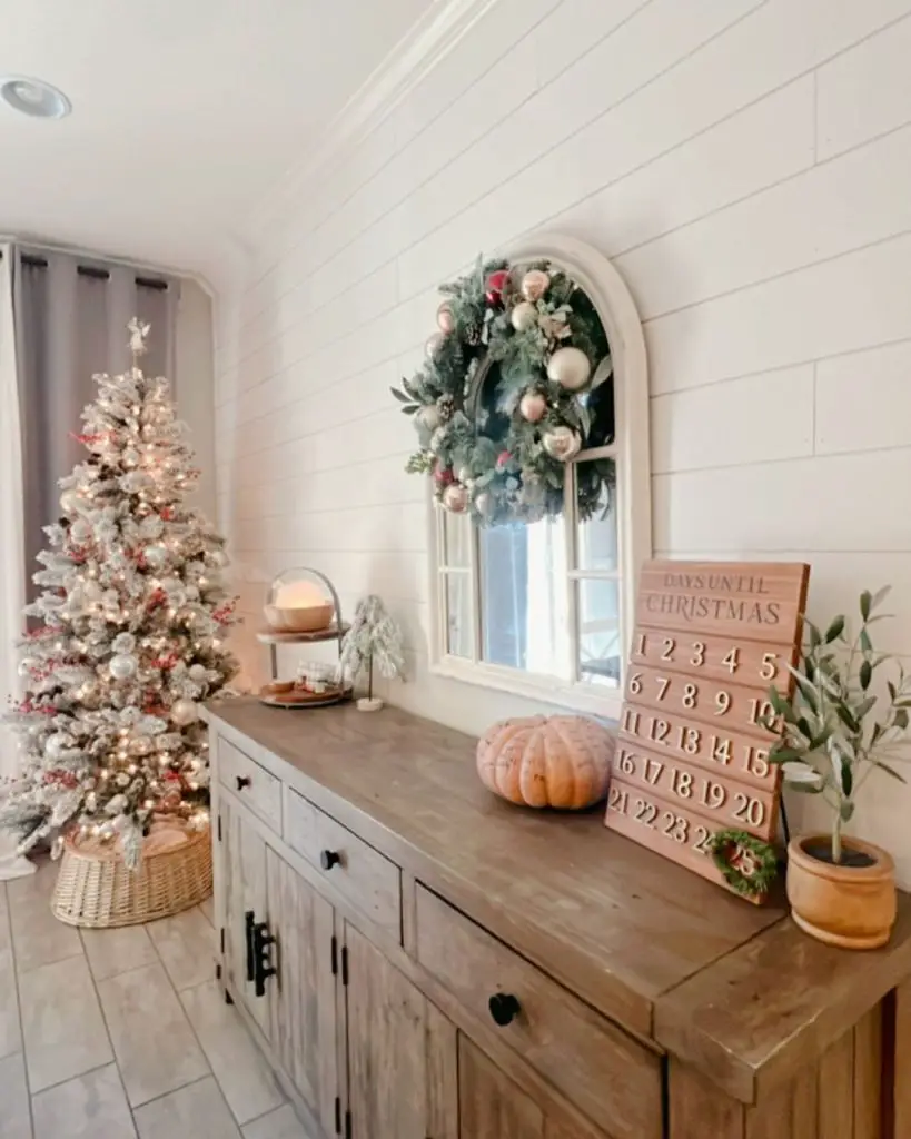 Charming entryway with a Christmas tree, wreath, and countdown calendar