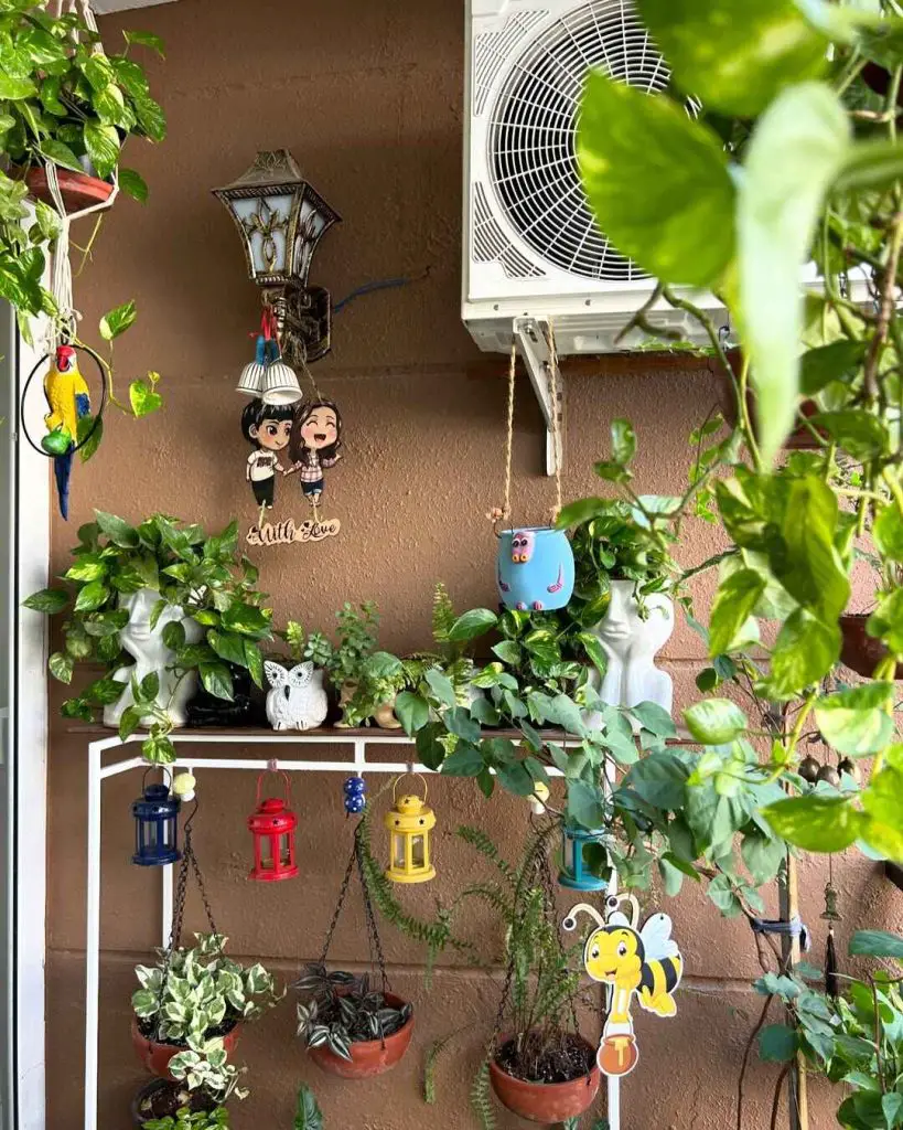 Vertical garden with potted plants, colorful lanterns, and playful decorations.